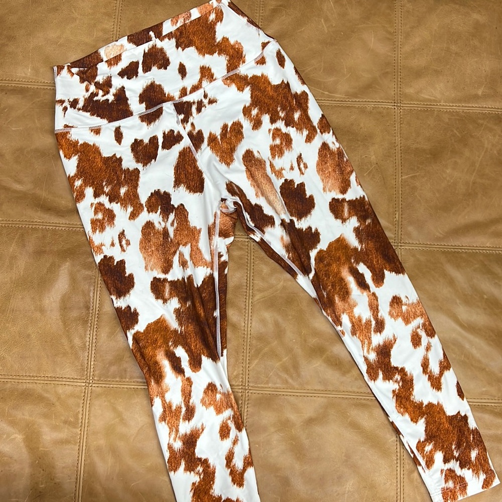 We Wore What cow print leggings